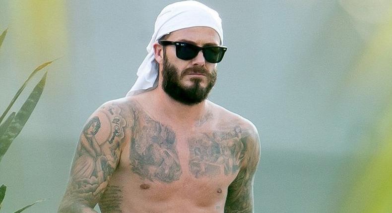 David Beckham shows off extensive tattoos on his balcony
