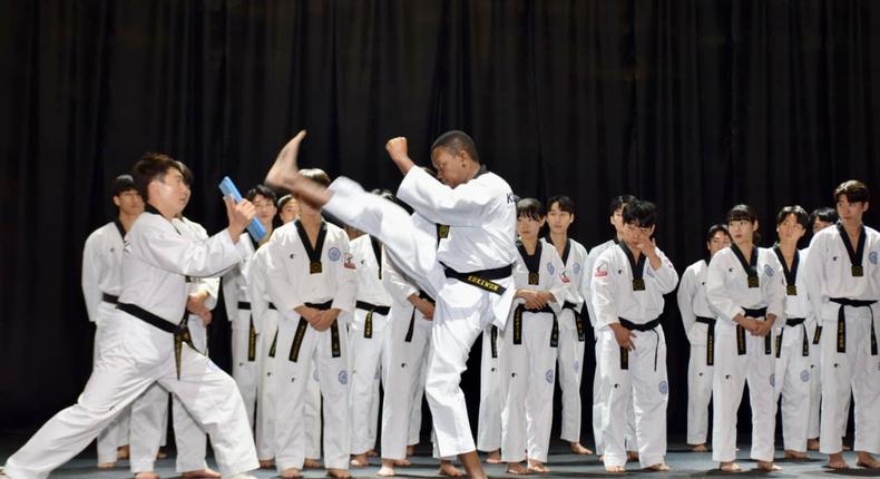 Foreign and Diaspora Affairs Cabinet Secretary (CS) Dr. Alfred Mutua  displaying his skills at the World Headquarters of Tae Kwondo (Kikkuwon) in South Korea