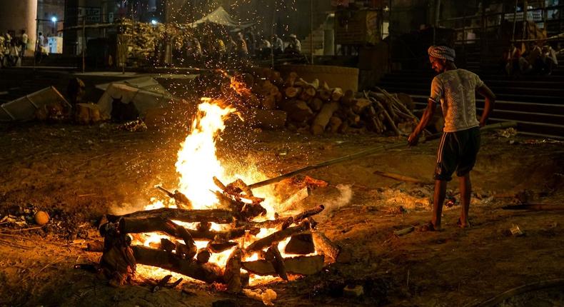 File photo: The Doms, a group belonging to a Hindu caste, earn their living by running the cremation pyres and maintaining the source fire that is used to light all of the pyres.