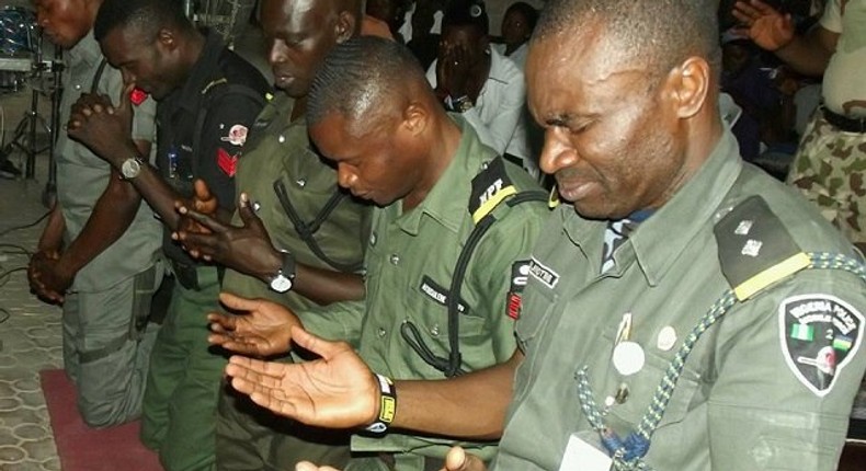 The gallant officers thanking God for keeping them alive