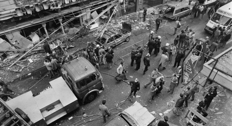 Police examine the site of a car bomb in the Rue Marbeuf, Paris, in April, 1982 attributed to Carlos the Jackal, a Venezuelan named Ilyich Ramirez Sanchez
