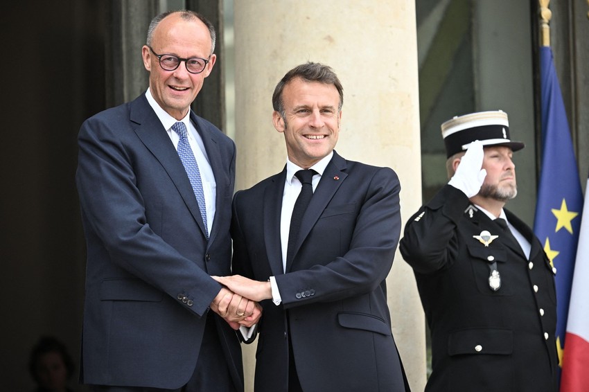 Fridrih Merc i Emanuel Makron