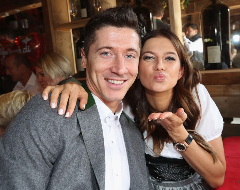 FC Bayern Munich's Lewandowski and his wife Anna pose during their visit at the Oktoberfest in Munic