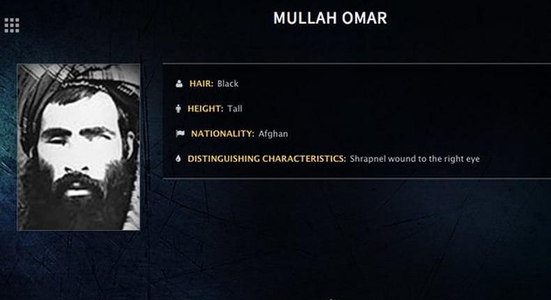 Mullah Omar is seen in a wanted poster. 