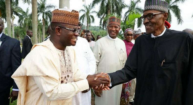 Governor Yahaya Bello (left) with President Muhammadu Buhari (right)