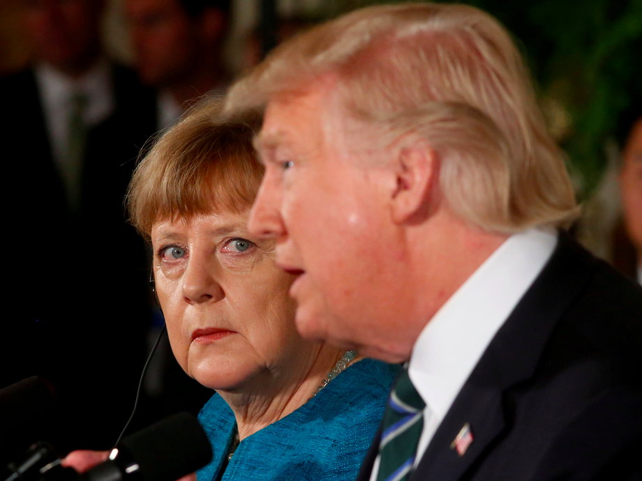 Germany's Chancellor Angela Merkel and U.S. President Donald Trump hold a joint news conference in the East Room of the White House in Washington, U.S., March 17, 2017.