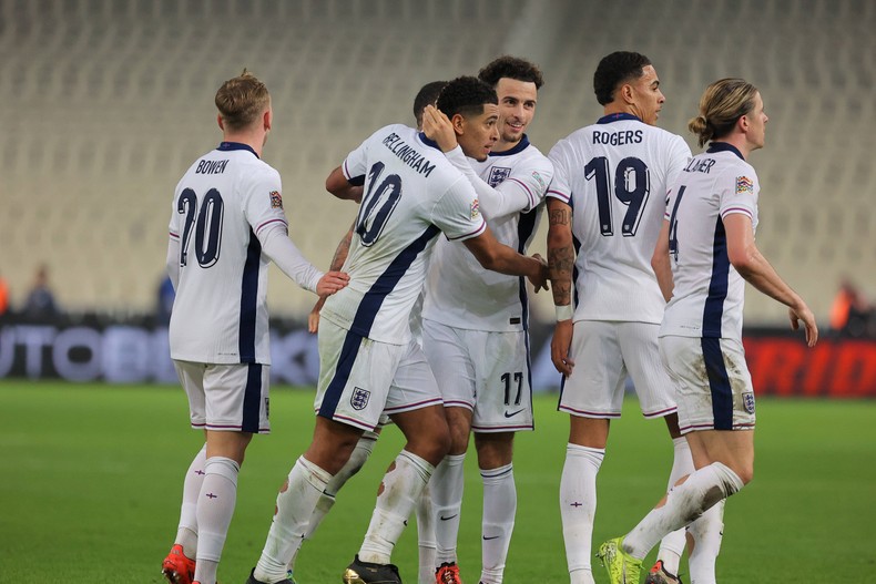 England players celebrating a goal against Greece