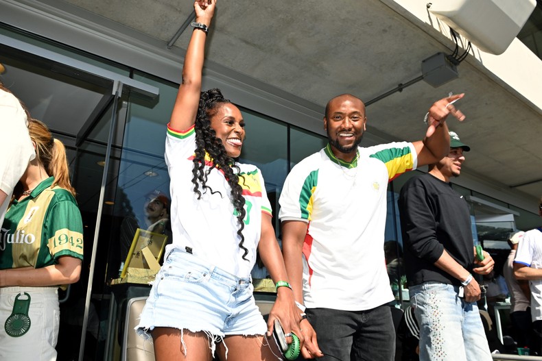 Rae, whose father is from Senegal, and her husband, Louis Diame, who is Senegalese, were seen cheering on Senegal during their game against France on June 16.