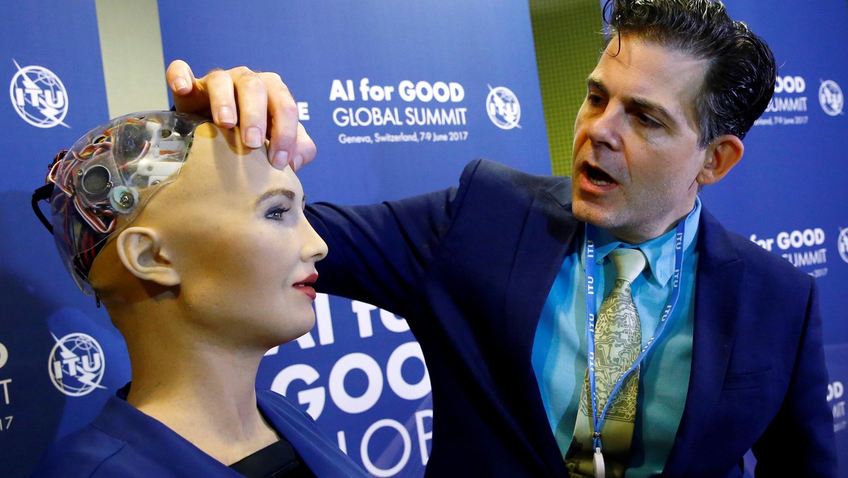 David Hanson of Hanson Robotics presents Sophia, a robot integrating the latest technologies and artificial intelligence is pictured during a presentation at the AI for Good Global Summit in Geneva