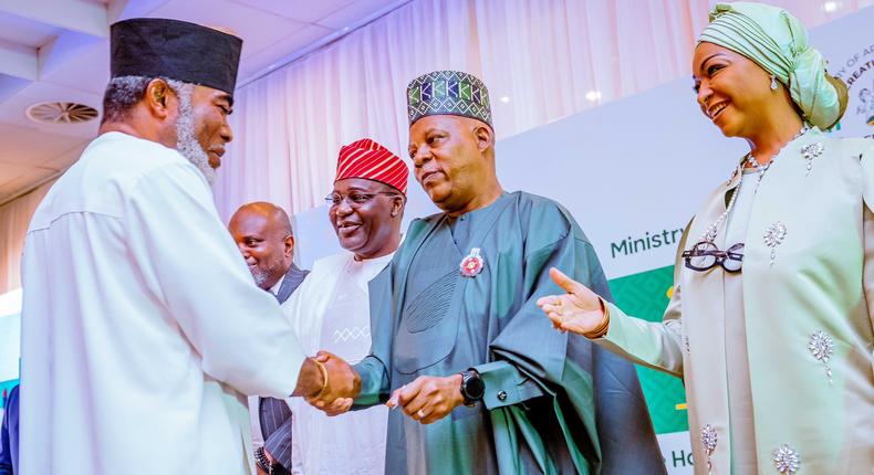 Vice-President Kashim Shettima, flanked on the right by the Minister of Art, Culture and Creative Economy, Hannatu Musawa, exchanging pleasantries with Nollywood veteran, Zack Orji [Presidency]