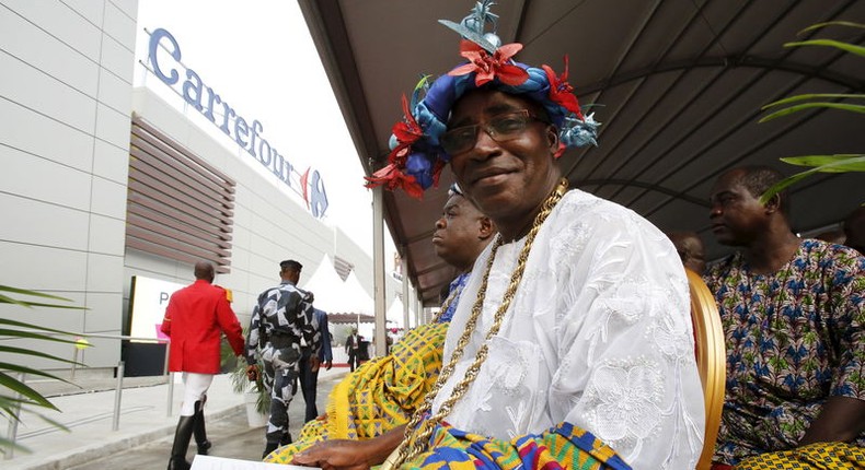 A local traditional chief is seen at the PLAYCE mall housing the French supermarket Carrefour after its inauguration by Ivory Coast's President Alassane Ouattara in Abidjan, Ivory Coast, December 18, 2015. REUTERS/Thierry Gouegnon