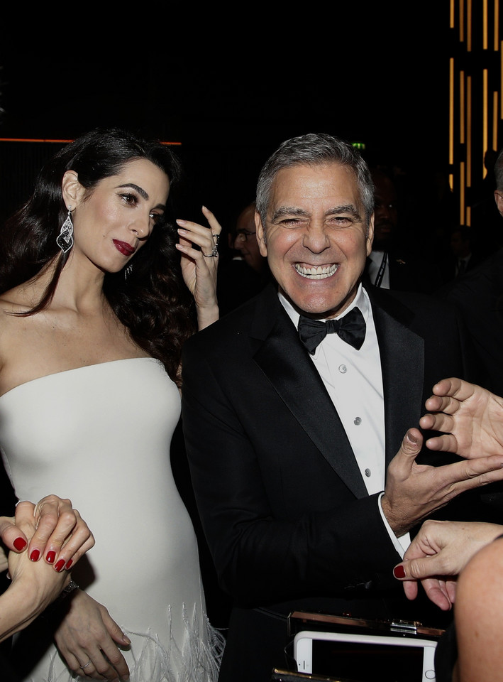 George Clooney i jego ciężarna żona Amal Clooney na gali Cezary 2017