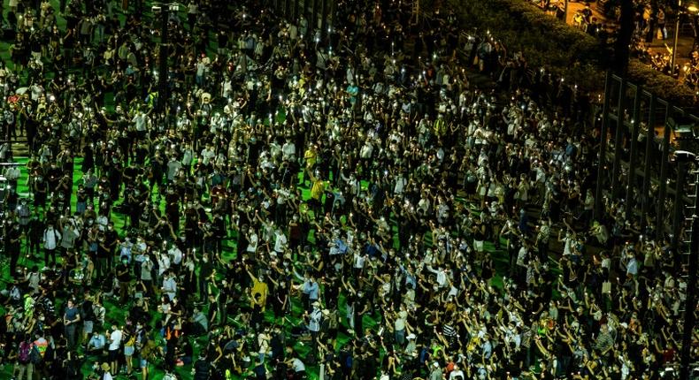 Thousands of Hong Kongers took part in a ceremony to mark the 1989 Tiananmen Square crackdown despite it being banned by authorities