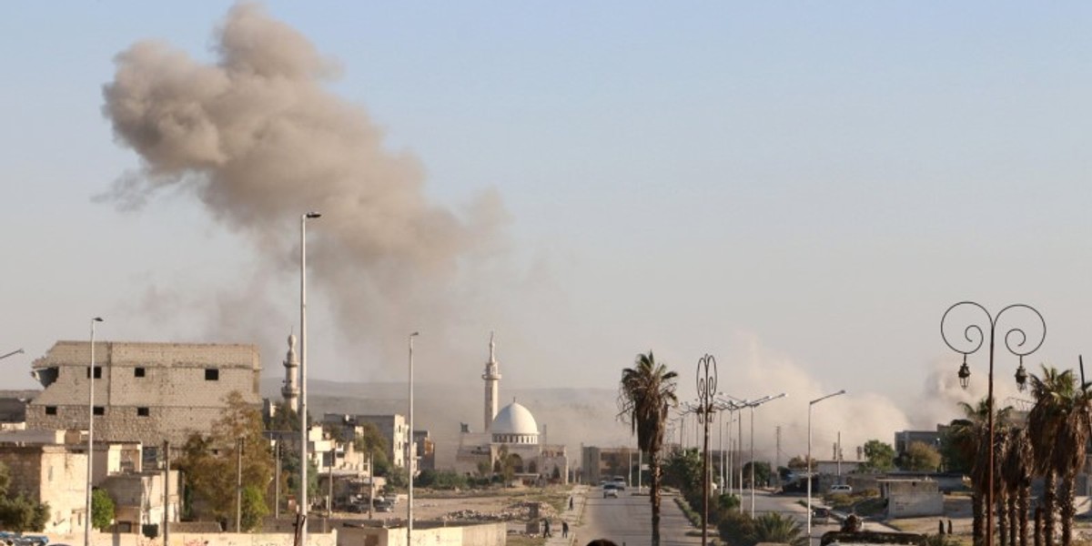 Smoke rises after an airstrike in Syria.