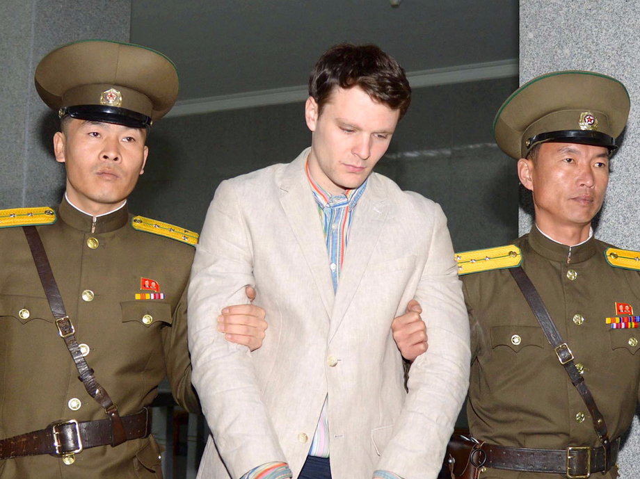 Otto Frederick Warmbier (C), a University of Virginia student who was detained in North Korea since early January, is taken to North Korea's top court in Pyongyang, North Korea, in 2016.