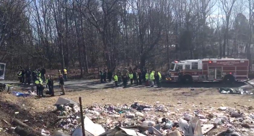 View of the scene following the accident when a train traveling from Washington to West Virginia car