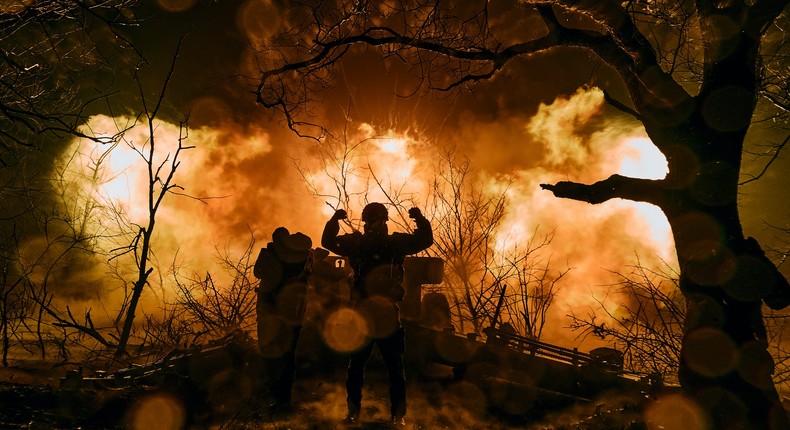 FILE - Ukrainian soldiers fire artillery at Russian positions near Bakhmut, in the Donetsk region of Ukraine, on Nov. 20, 2022.AP Photo/LIBKOS, File