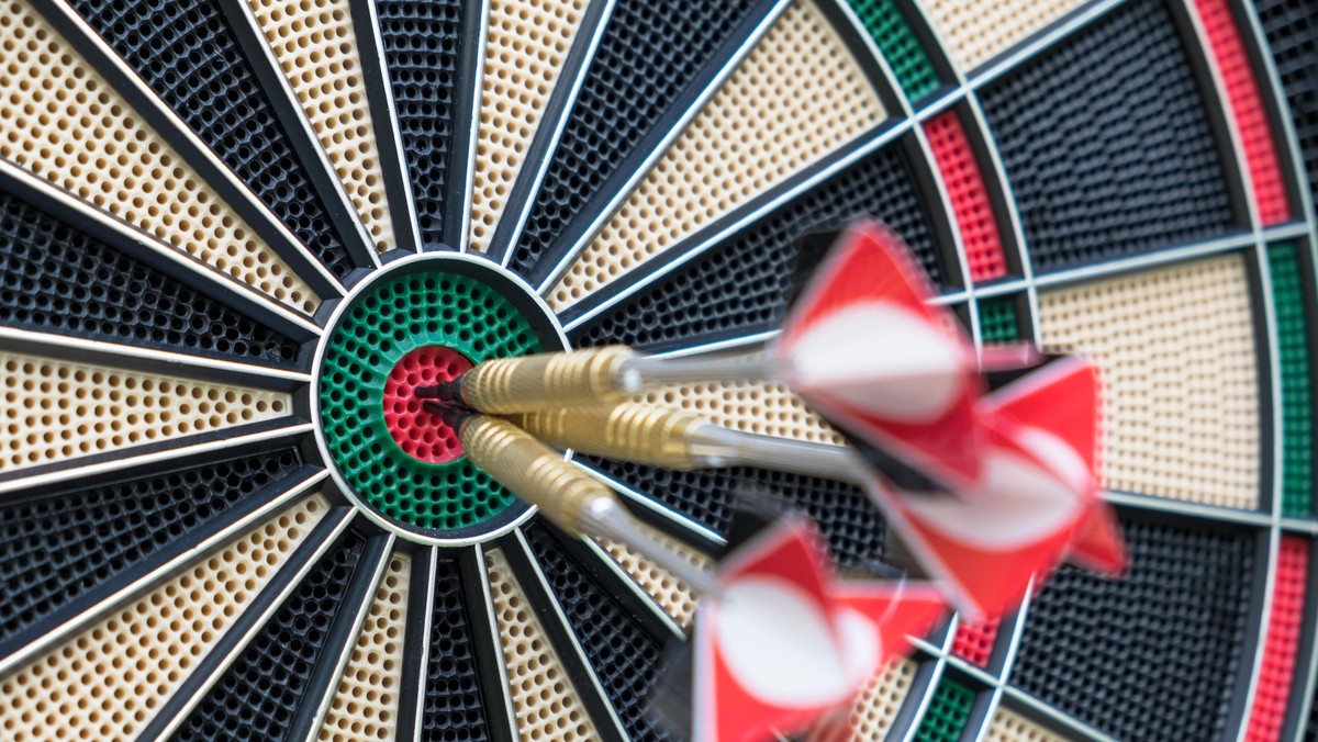 Close-Up Of Arrows In Dartboard