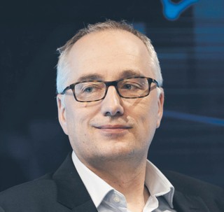 Patryk Gęborys partner EY Polska, zespół bezpieczeństwa informacji i technologii