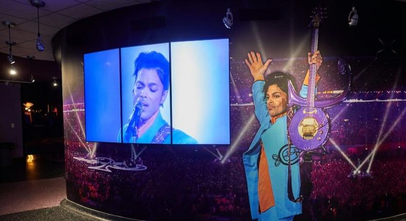 The first anniversary of the death of Prince is marked amid discord over the commercialization of his legacy