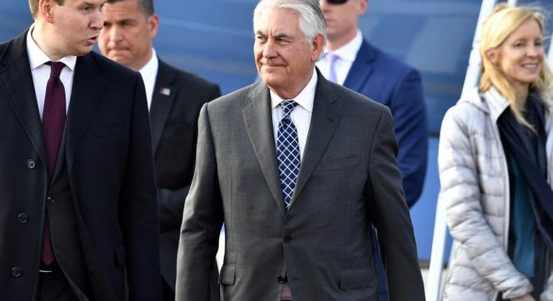 US Secretary of State Rex Tillerson (C) walks upon his arrival at the Vnukovo II Government airport in Moscow on April 11, 2017