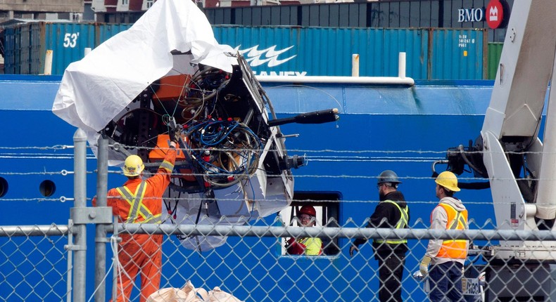 Debris from the Titan submersible, recovered from the ocean floor near the wreck of the Titanic, is unloaded from the ship Horizon Arctic at the Canadian Coast Guard pier in St. John's, Newfoundland, Wednesday, June 28, 2023.Paul Daly/The Canadian Press via AP