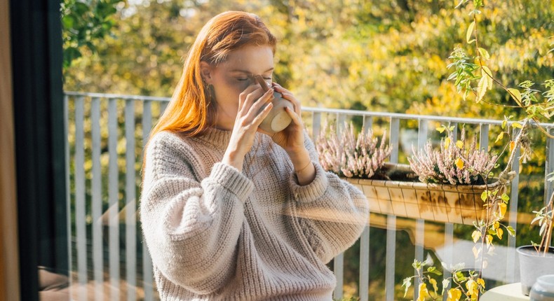 Period cramps suck but it's a good excuse to curl up with a warm cup of tasty tea.Counter/Getty Images