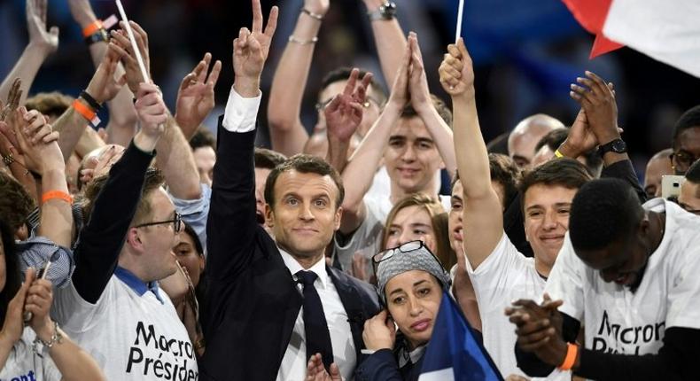 Pro-EU centrist Emmanuel Macron on the campaogn trial before storming to victory in the French presidential election