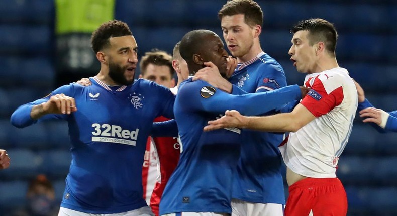 Ondrej Kudela (R) was given a 10-match ban for racially abusing Rangers midfielder Glen Kamara (C) earlier this year Creator: Andrew Milligan