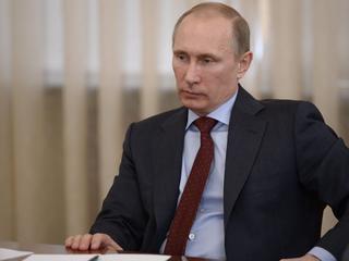 Rosyjski prezydent Władimir Putin podczas spotkania z doradcami. Marzec 2014