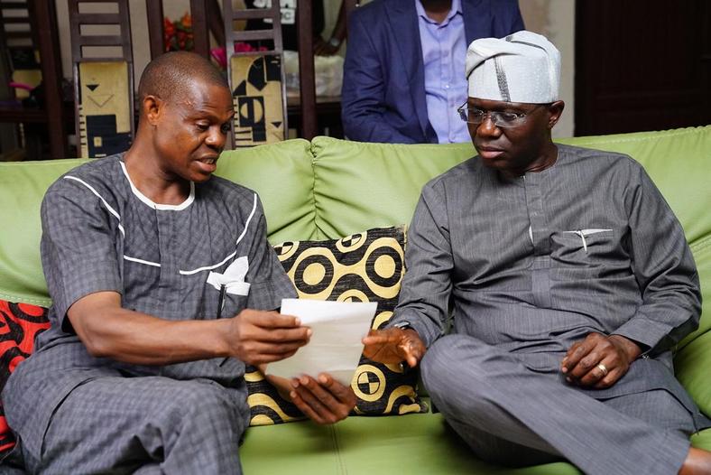 Johnson's father, Alhaji Remi Lukman and Lagos State governor-elect, Babajide Sanwo-Olu. (Mr JAGs/Twitter) 