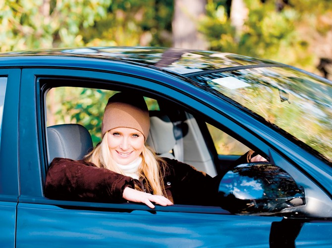 12185_stock-photo-a-young-woman-sitting-in-drivers-seat-of-a-saloon-car-shutterstock_13325971