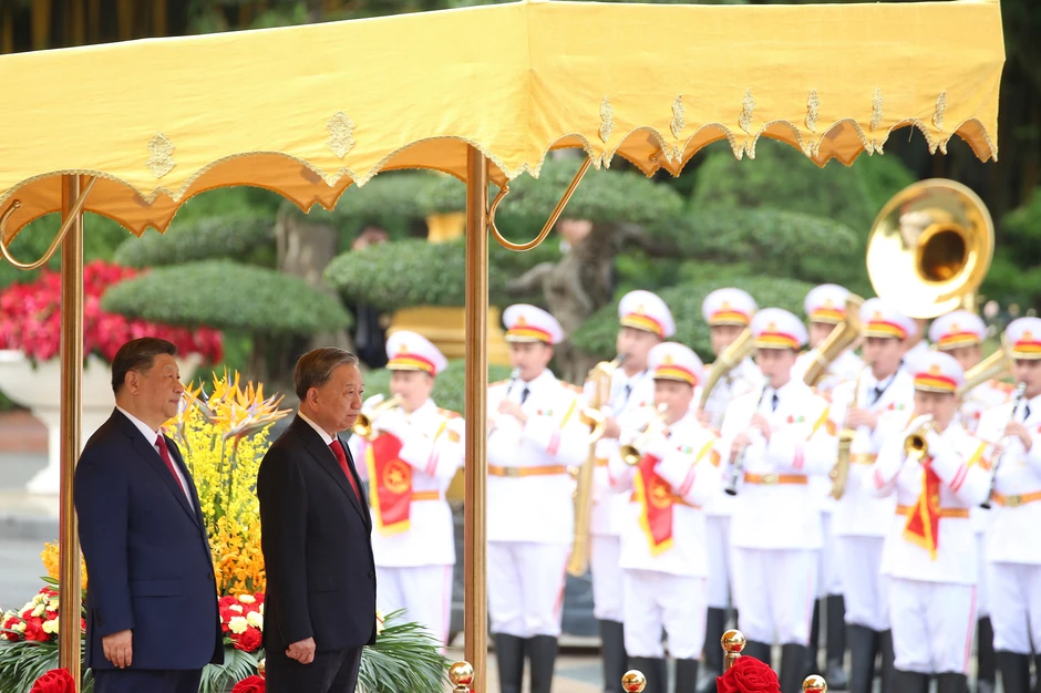 Si Đinping i generalni sekretar KP Vijetnama To Lam u Hanoju 14. aprila