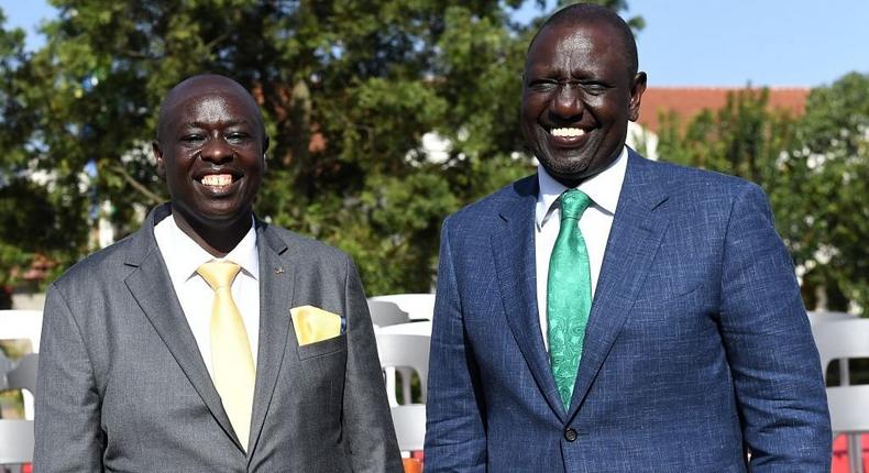 Kenya's Deputy President, and also Kenya Kwanza Alliance presidential candidate William Ruto (R), pose for a photo with his running mate Rigathi Gachagua, at the Deputy's official residence in Karen, Nairobi, on May 15, 2022. (Photo by SIMON MAINA/AFP via Getty Images)