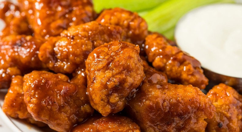 Boneless wings are actually made from breast meat.bhofack2/Getty Images