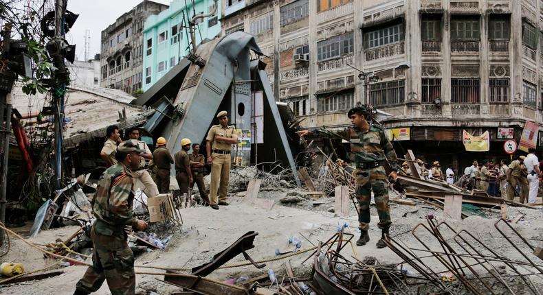 Indian police file homicide case after flyover collapse kills 23