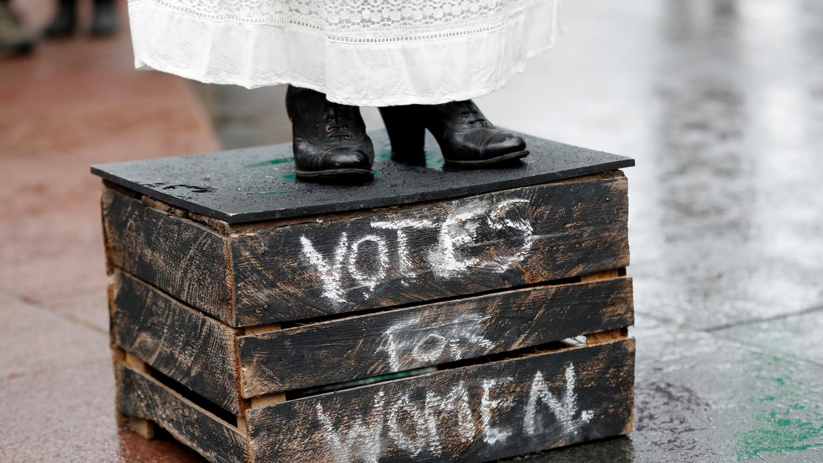 Councillor Elaine Pantling, dressed as suffragette Alice Hawkins, speaks during an event to mark 100 years of votes for women in Leicester