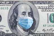 US quarantine, 100 dollar banknote with medical mask. The concept of epidemic and protection against coronavrius.