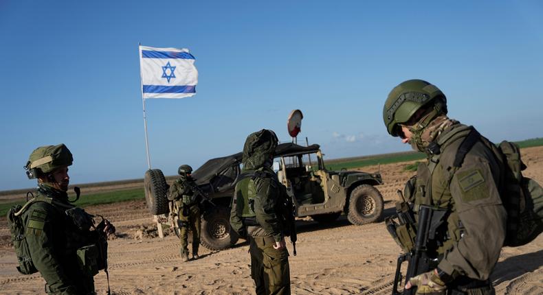 Israeli soldiers are seen near the Gaza Strip border in southern Israel on March 4, 2024.AP Photo/Ohad Zwigenberg