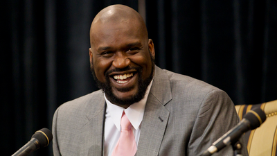 FILE PHOTO: Shaquille O'Neal laughs while telling a story during his announcement of his retirement from the National Basketball Association (NBA) at a news conference at his home in Windermere, Florida June 3, 2011. REUTERS/Scott Audette