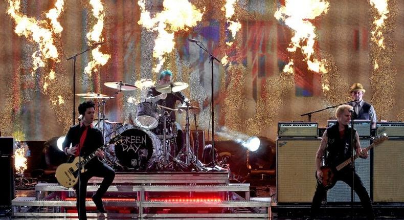 (L-R) Musicians Billie Joe Armstrong, Tre Cool and Mike Dirnt of Green Day perform onstage during the 2016 American Music Awards on November 20, 2016 in Los Angeles, California