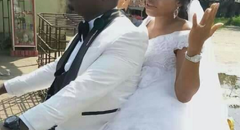Newly weds spotted on a motorbike