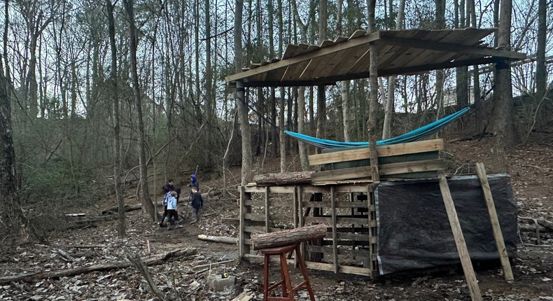 The author's son spends time in the woods with his friends building structures and getting dirty.Courtesy of the author