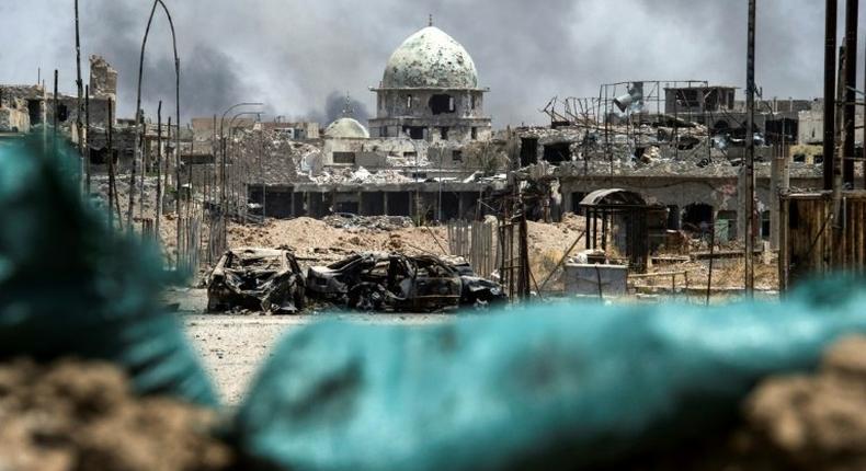 A picture taken on July 2, 2017 shows a general view of a destroyed mosque in the Old City of Mosul, during the government offensive to retake the city from Islamic State (IS) group fighters