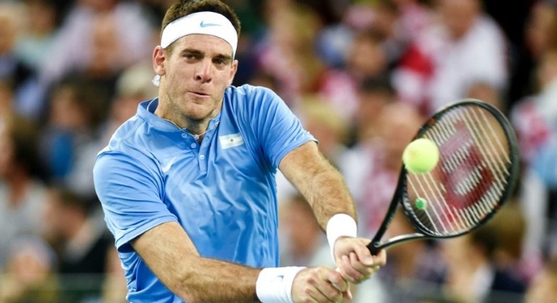 Argentina's Juan Martin del Potro returns the ball to Croatia's Marin Cilic during the Davis Cup World Group final singles match between Croatia and Argentina on November 27, 2016 at the Arena hall in Zagreb