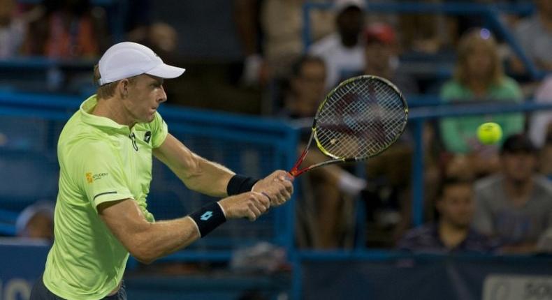 Kevin Anderson of USA competes with Dominic Thiem of Austria in Washington, DC