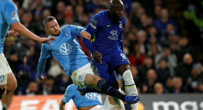 Malmo defender Lasse Nielsen fouls Chelsea striker Romelu Lukaku Creator: Adrian DENNIS