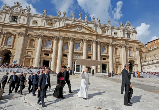 Pope Francis waves during the weekly audience in Saint Peter's Square at the Vatican 