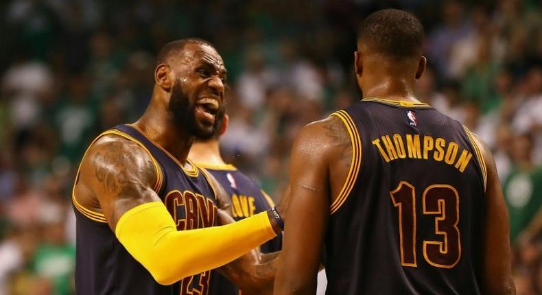 LeBron James reacts with Tristan Thompson of the Cleveland Cavaliers during Game One of their playoffs series against the Boston Celtics at the 2017 NBA Eastern Conference Finals on May 17, 2017 in Boston