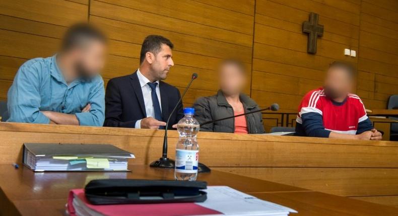 The presiding judge called the tragedy 'foreseeable and avoidable' as he handed down verdicts of people trafficking leading to loss of life. The three men are shown with a translator